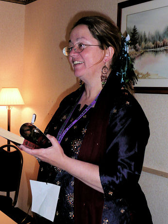 Patty signing a book